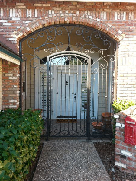 Front enterance iron gate with swirl detailing
