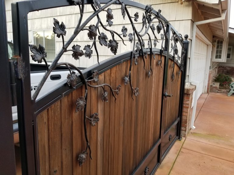 wrought iron gate with wood and iron