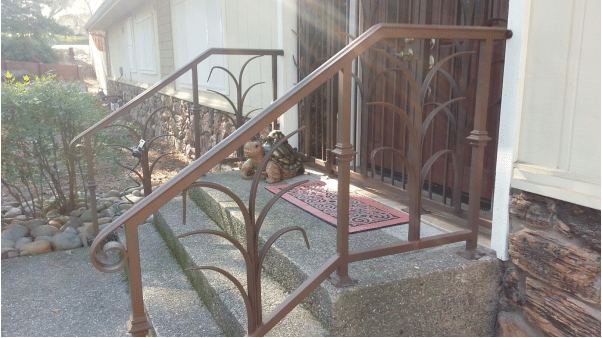 beautiful stair handrail made of wrought iron