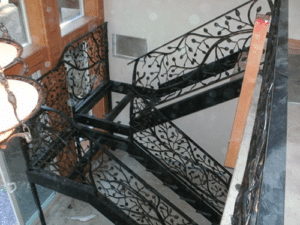 iron stair railing before installation