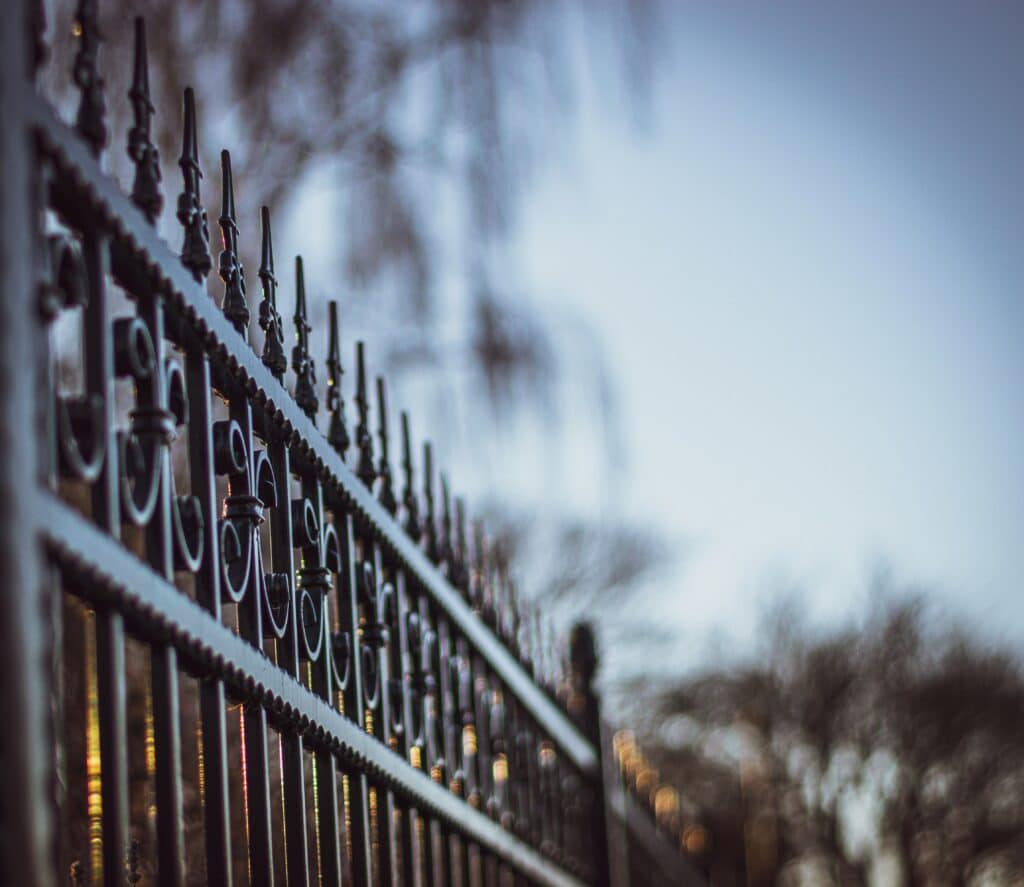 a fence made of iron and warmth