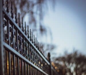 a fence made of iron and warmth